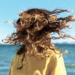 Why Hair Turns Curly and Frizzy in the Summer months, according to Chemistry
