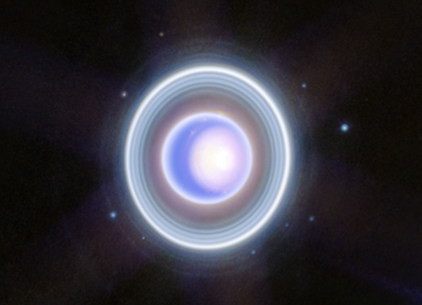 The Rings of Uranus Glow in Epic JWST Photograph